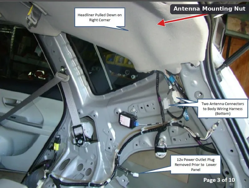 Interior view of a Toyota Prius with the rear headliner partially dropped to access the roof antenna mounting nut.