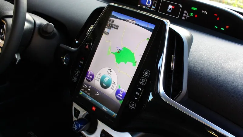 The large, vertically-oriented 11.6-inch touchscreen found in 4th Generation Toyota Prius Prime models.