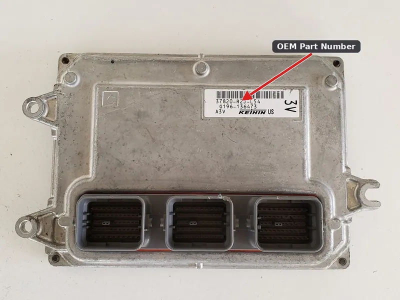 A used Engine Control Module for a 2014-2015 Honda Civic, showing the manufacturer label and part numbers.