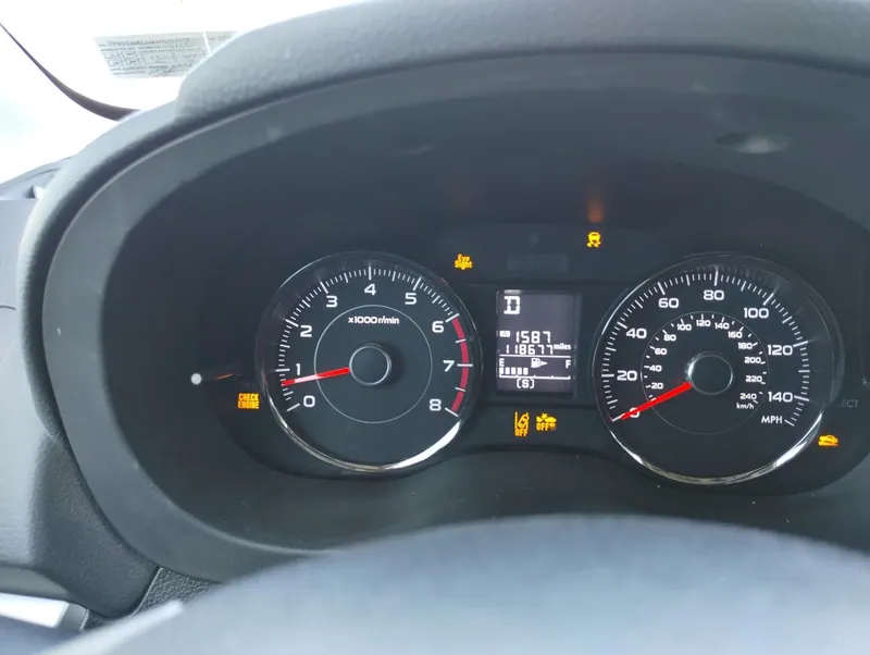 2016 Subaru Forester dashboard illuminated with multiple warning lights including Check Engine, VDC, and Hill Start Assist.