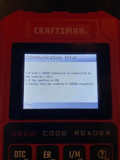 A professional OBD-II scan tool displaying diagnostic trouble codes, emphasizing the need to check for network U-codes.