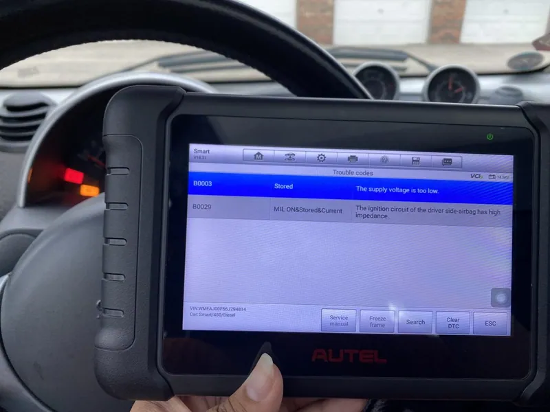 A professional bidirectional OBD2 scanner displaying the C1941 diagnostic trouble code.