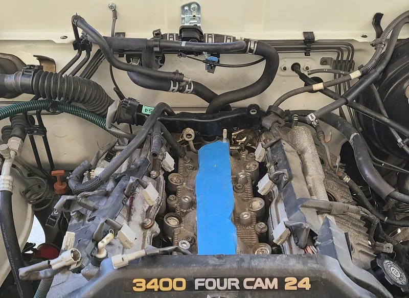 The engine bay of a 3rd generation Toyota 4Runner featuring the 5VZ-FE 3.4L V6 engine.