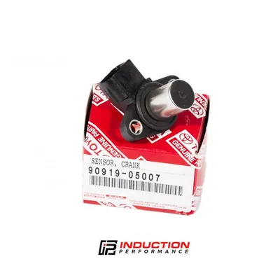 A new OEM Denso camshaft position sensor ready for installation.