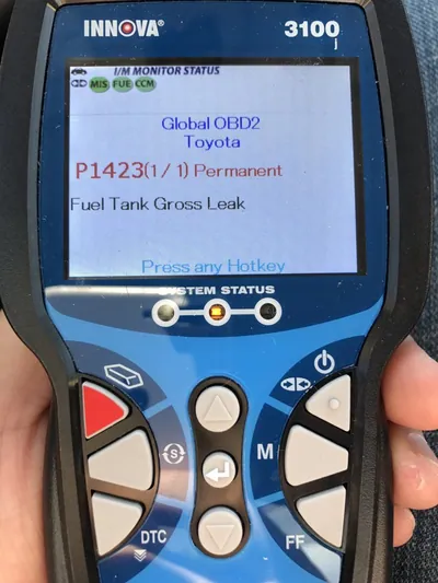 An OBD2 scanner screen displaying the P1423 diagnostic trouble code.