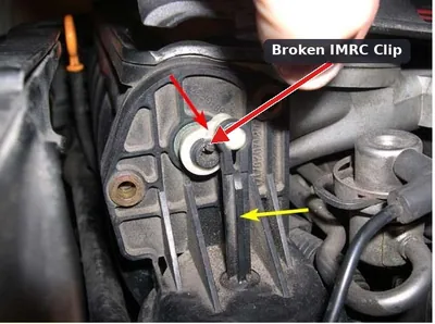 A broken plastic retaining clip on an Intake Manifold Runner Control (IMRC) linkage rod.