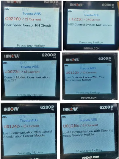 An OBD2 diagnostic scan tool displaying communication error codes like U0124 and U0073.