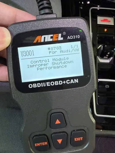 An OBD-II scanner displaying a network communication or control module fault code.