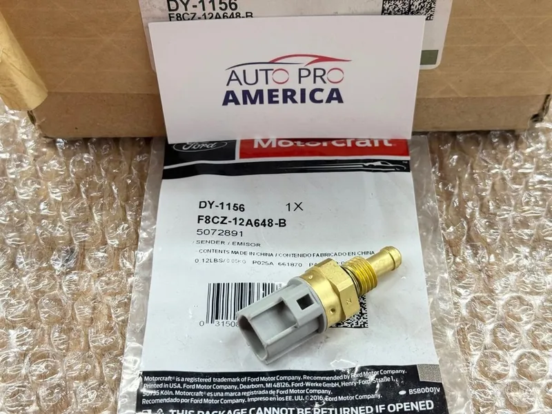 A premium aftermarket engine temperature sensor in its retail packaging.