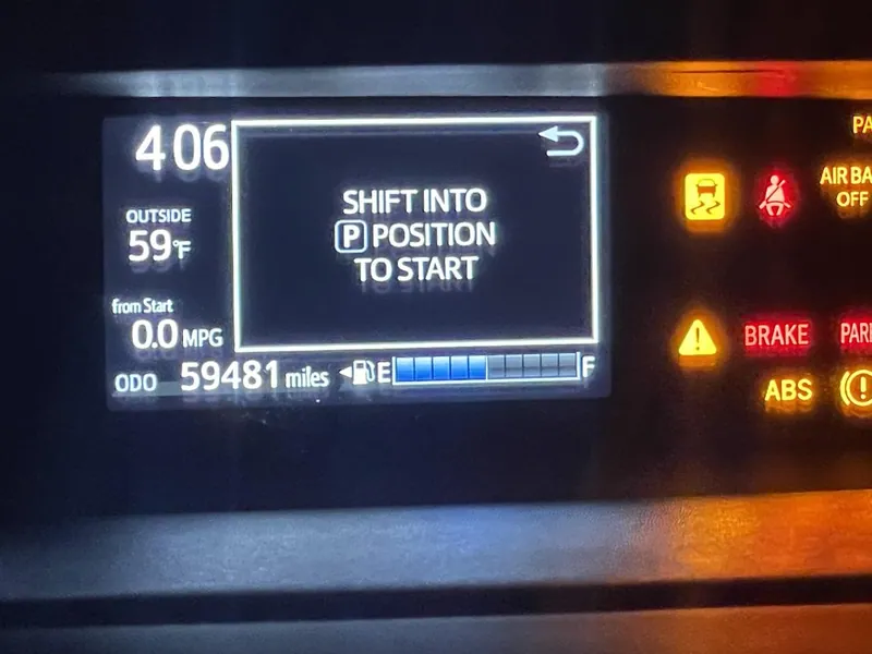 A Toyota Prius dashboard displaying the 'SHIFT TO P POSITION TO START' warning message.